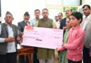 सैनिक कल्याण मंत्री गणेश जोशी ने मृतक उपनलकार्मिक के पिता को सौंपा 50 लाख का चैक